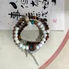 Fabricantes fornecem pulseira de cerâmica de liga novo estilo chinês feito à mão versátil estilo nacional pulseira de cerâmica de círculo duplo estilo étnico minoritário