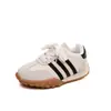 Zapatillas para niñas 2026 primavera y otoño nuevo modelo Zapatos de entrenamiento alemanes para niños Zapatos deportivos casuales transpirables para niños Zapatos de suela blanda Forrest Gump para niños