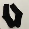 Meias grossas quentes antibacterianas de outono e inverno até a panturrilha, meias femininas da moda com design único, meias empilháveis versáteis e populares