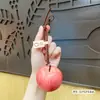 Colgante de Manzana para Coche al por Mayor para Viajes Seguros, Llavero, Decoración Creativa para el Interior del Coche, Adorno para Colgar en el Espejo Retrovisor, Pieza de Exhibición