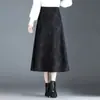 Falda de lana a cuadros de longitud media a la moda para mujer, otoño 2026 nueva de cintura alta, línea A, que cubre la cadera, fluida, moderna