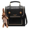 Bolsa de Crowdsourcing Pequena com Senso de Design Feminina 2024 Mochila Versátil Portátil Estilo Coreano Mochila Escolar Mochila de Viagem Retrô