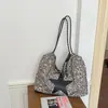 Bolsa de mão transfronteiriça estilo coreano com estampa de leopardo para mulheres, bolsa de ombro acolchoada de cor sólida, estilo de luxo leve e requintado, bolsa transversal versátil