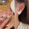 Moda nuevos aretes de tuerca de tulipán de perla rosa encantadores, diseño de temperamento de nicho dulce y lindo, aretes que combinan con todo