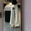 Jeans de pierna ancha de tiro alto estilo americano color blanco roto para mujer, nuevo modelo otoño 2026, corte holgado, adelgazantes, pantalones rectos elegantes