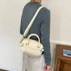 Bolso de mano de moda estilo coreano 2026 principios de otoño nuevo bolso para mujer, alto valor estético, bolso de hombro color block con decoración de cinturón, bolso cruzado