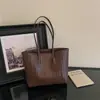 Nueva bolsa de hombro retro minimalista 2026 para mujer, gran capacidad, casual, para ir al trabajo, bolso de mano con textura tejida