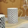 Taza y Platillo de Porcelana Europea de Siete Puntas para Té de la Tarde Café Pareja Taza para el Hogar Taza de Agua Regalo de Alto Valor Venta al por Mayor