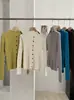 KEKEZOON Suéter de Punto con Cuello Alto Acanalado para Mujer Otoño Ajuste Delgado Diseño de Botones Manga Larga Top Adelgazante 9520