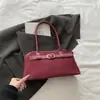 Moda Transfronteiriça para o Trabalho 2025 Elegante Casual Bolsa de Ombro Feminina Nova de Design de Nicho Grande Capacidade Bolsa de Braço