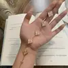 Collar Láser Buqi Lati Oro Rosa Cepillado Italiano Trébol de Cuatro Hojas Pulsera de Cinco Flores Anillo Láser Pendientes