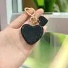 Llavero Creativo de Corazón con Pedrería Colgante para Coche Creativo Anillo de Resorte Dorado con Forma de Corazón Decoración para Mochila Decoración para Bolsa
