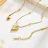 Acero de Titanio Completo Transfronterizo Más Vendido Diseño de Nicho Cadena de Hueso de Serpiente Perlada con Colgante de Corazón Puntiagudo Moda Tendencia Venta Directa del Fabricante
