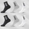 Fábrica Xinma Deportes Europeos y Americanos Ins Calle Patineta Moda Marca Calcetines con Letras Calcetines de Longitud Media Modernos