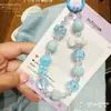 Nova Corrente de Celular com Boneco Pinóquio de Desenho Animado com Miçangas Transparentes M&M Pintadas à Mão Chaveiro Pingente para Capa de Celular Venda por Atacado