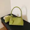 Bolso cruzado francés simple tejido tipo Baguette para mujer 2026 Verano Nuevo estilo Temperamento Bolso para madre e hijo Viaje diario Bolso de axila