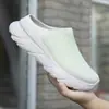 Calcetines transpirables de punto volador de gran tamaño transfronterizos y zapatillas de casa, zapatillas deportivas casuales de verano para pareja, zapatillas para correr, zapatos de malla de suela blanda