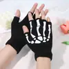 Guantes sin dedos de calavera creativos de Halloween Garras de fantasma Transfronterizos Guantes de medio dedo para adultos Teclado Guantes de garra para dispensar