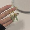 Nuevos pendientes de borlas con carácter feliz de turmalina verde china, moda nacional, pendientes festivos de campana de la suerte de oro arena antiguo, pendientes para mujer