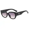 Nuevas y elegantes gafas de sol estilo ojo de gato de Hong Kong con un aire sofisticado, versátiles para la moda al aire libre y protección solar, adecuadas tanto para hombres como para mujeres