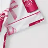 Conjunto de Pijama Cardigan Rosa de Seda Leite Transfronteiriço Europeu e Americano para Mulheres, Shorts de Manga Curta, Roupa de Casa Confortável e Respirável Conjunto Casual