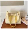 Otoño Invierno 2026 Bolso Cubo Versátil Fresco con Cadena Bolso de Hombro Único de Moda Simple para Viajes Diarios Bolso de Axila Estilo Coreano Bolso de Tela para Mujer