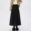 Moda y versátil falda plisada de pana para mujer, nuevo estilo otoño e invierno, elegante falda midi plisada de dobladillo amplio