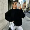 Nuevo suéter de punto casual holgado de color liso estilo europeo y americano para otoño e invierno, jersey de punto grueso de cuello redondo con trenzas para mujer