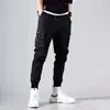 Overol de alta gama con sentido de verano para hombre 2024 nuevo estilo coreano con múltiples bolsillos, pantalones tipo legging casual para adolescentes