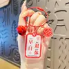 Tarjeta de texto de amuleto de la suerte creativo Ping An Xi le llavero acrílico colgante para mochila de pareja saludo pequeño regalo