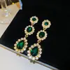 Aretes de aguja plateada con diamantes, diseño de flor ovalada de resina y gota de agua, estilo retro vintage, aretes versátiles