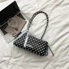 Design de nicho estilo coreano moda casual nova bolsa de ombro simples e única com textura 2026 outono bolsa feminina de axila