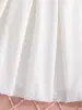 Ropa para niños de comercio exterior, primavera y otoño, vestido para bebé con cuello redondo, color liso, flores pequeñas dulces tridimensionales y puños con volantes