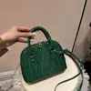 Nova Bolsa Feminina 2026 Mini Novo Estilo Versátil Concha Moda Feminina Bolsa de Mão Bolsa de Ombro Bolsa Transversal