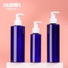 Botella cosmética de plástico PET azul transparente, subbotella de loción de 100-200 ml, botella de prensa para desmaquillante corporal de 250 ml