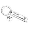 Llavero de pareja con personalidad familiar, de venta transfronteriza, con conducción segura, de acero inoxidable negro, con letras creativas.