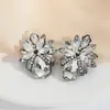 Pendientes de flores de diamantes de colores de aleación europea y americana transfronterizos, pendientes de cristal de lujo de alta gama con baño electrolítico para mujer, pendientes de circonita y cristal