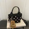 2026 Otoño Temprano Nuevo Exquisito Bolso Cruzado de Lunares para Mujer Bolso de Cubo Vintage de Gamuza de Moda Bolsos para Mujer al por Mayor