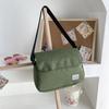 Dropshipping de Mochilas Femininas e Masculinas, Estilo Coreano e Japonês, Transversal de Ombro Único 2024 Nova Tendência Casual Transversal Pequena Bolsa de Casal