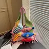Bolsa de punto patchwork versátil de flecos retro de nicho transfronteriza, bolso de hombro color block, bolso tote, nuevo estilo Primavera 2026