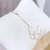 Versão coreana de pulseira de borboleta frítila branca concha temperamento simples pulseira feminina pulseira joker pulseira feminina joias atacado