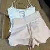 Conjunto de dos piezas para casa, top tipo camisola blanco con estampado de Hello Kitty de dibujos animados, con copas en el busto y shorts rosas ajustados
