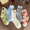 Calcetines divertidos de dibujos animados calcetines de longitud media para niños calcetines de algodón de moda primavera y otoño estudiantes lindos japoneses diseño de nicho calcetines