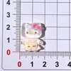 Lindos Colores Transparentes de Moda Dibujos Animados Gato KT Adornos Pequeños DIY Parches Al Por Mayor Accesorios para el Cabello Infantiles Materiales Crocs Al Por Mayor