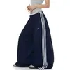 Pantalones de chándal retro a rayas de color block estilo americano, unisex, para otoño, con corte relajado, piernas anchas y diseño hasta el suelo
