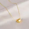 Collar de Frijol Dorado Simple Estilo Ins Japonés y Coreano Cadena de Cuello de Acero de Titanio que No se Desvanece Diseño de Nicho Cadena de Clavícula de Alta Gama para Mujeres