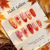 24 PIEZAS Colección de Arte para Uñas Bestseller Transfronterizo Navidad Halloween Flor Uñas Portátiles Ojo de Gato Halloween Piezas de Uñas Portátiles