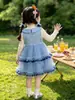 Conjunto de Vestido Bolo com Gola de Boneca Cartoon Outono para Meninas 2026 Novo Conjunto de Duas Peças Vestido Princesa Infantil Roupa Infantil Atacado