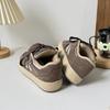 Zapatos de entrenamiento alemanes de suela gruesa de fideos de arroz para mujer 2025 primavera y otoño nuevos para estudiantes femeninas casuales originales padre zapatos deportivos H1390