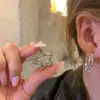 Brincos Minimalistas de Metal Tendência Estrela de Cinco Pontas para Mulheres, Novos Brincos de Tarraxa Estilo 2026, Acessórios de Orelha Estilo Cool, Argolas de Orelha de Temperamento Único